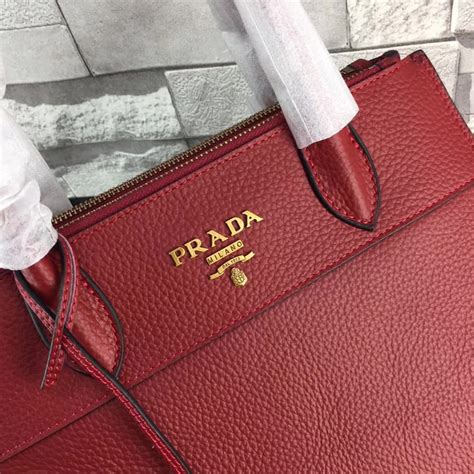 prada dark red bag|Prada black and red bag.